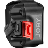 Back of mini LED video light with red battery compartment and USB-style charging port