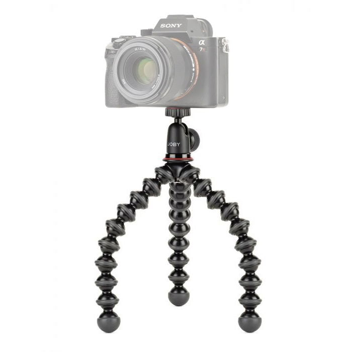 Mini flexible tripod with ball head, holding a camera