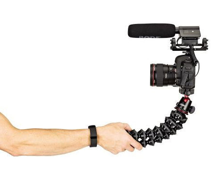 Flexible tripod held in hand, black ball head and camera mount