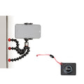 Magnetic mini tripod with flexible legs, smartphone mount, and wired remote control