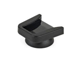 Black cold shoe mount with raised bracket and open slot for camera accessories