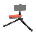 Support smartphone orange Joby avec pattes flexibles noires et écran gris