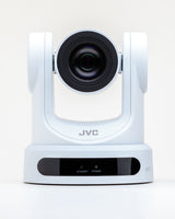 Front view of white PTZ camera with wide lens, motorized head, and base status strip