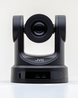 Front view of black PTZ camera with large 12x zoom lens and side arms