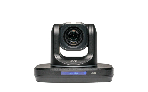 Black PTZ IP production camera front view, lens centered, status strip and 4K