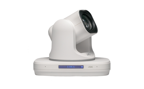 White PTZ IP camera on base, angled view of lens and head