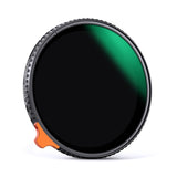 Variable ND lens filter with green-tinted edge reflection and orange side grip tab