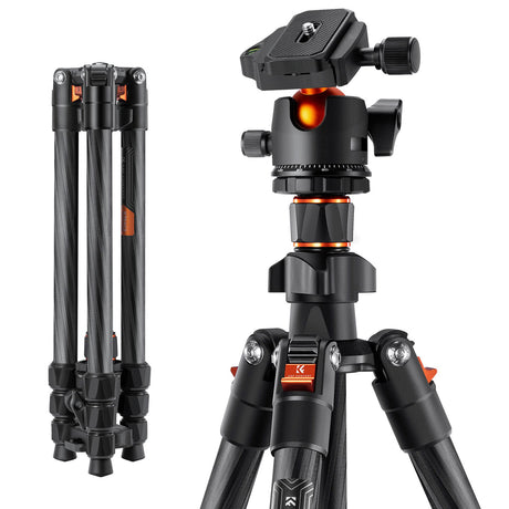 Carbon-fiber photo tripod with black head, orange accents, and adjustable knobs