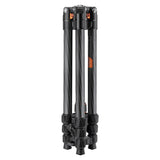 Black carbon-fiber tripod legs with multi-position locks and orange inlays