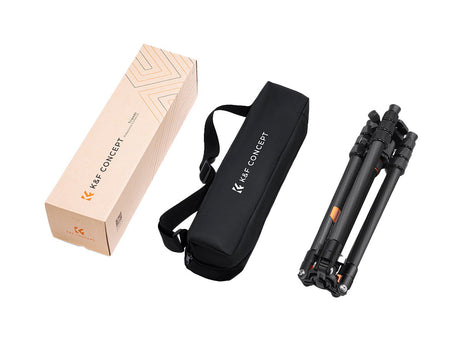 Black tripod carry bag and storage pouch with carbon-fiber tripod and box