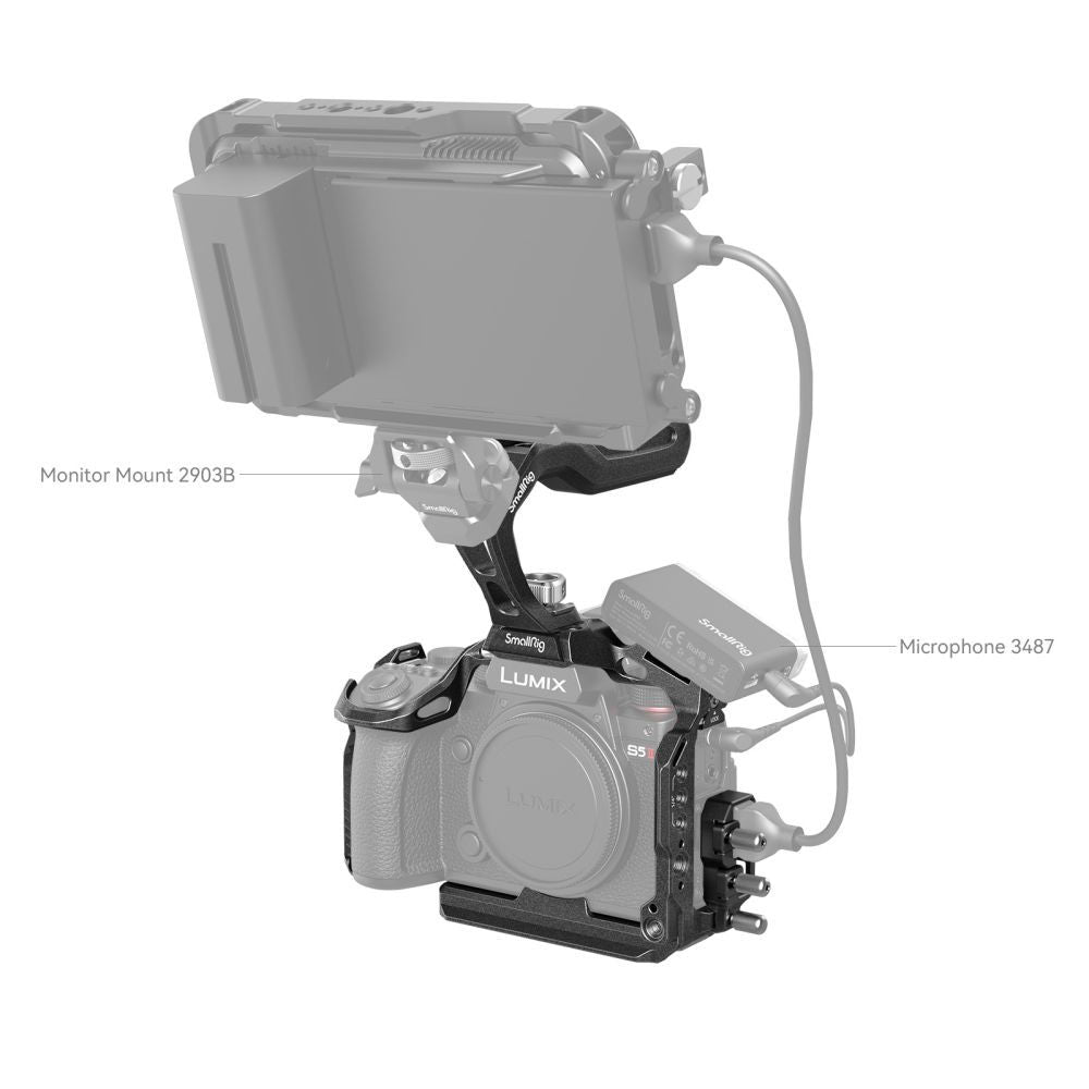 Black camera rig with monitor and microphone mounts for Lumix; cables attached