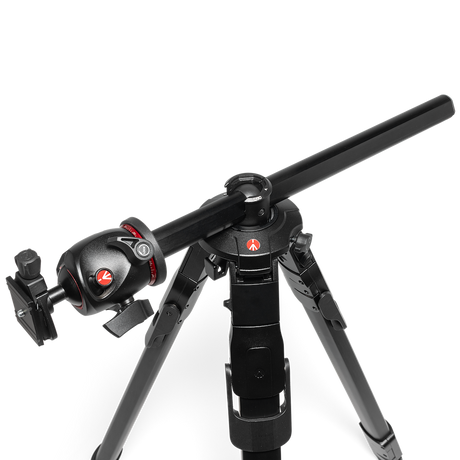 Ball head close-up with adjustment knobs and red markings; black tripod top mount