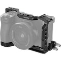Black camera cage kit with top handle, side rails, and multiple mounting holes