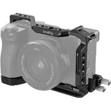 Black camera cage kit with top handle, side rails, and multiple mounting holes
