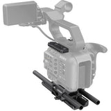 Camera rig with monitor mount, side handles, and carbon-fiber rail assembly
