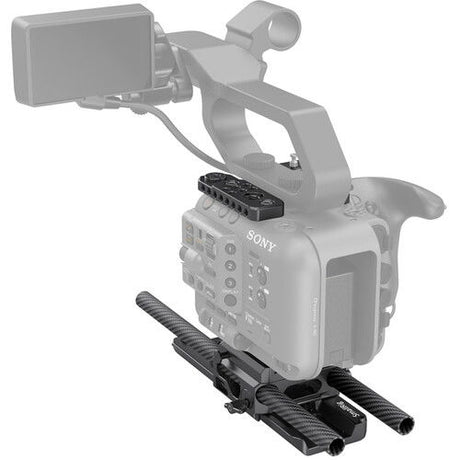 Camera rig with monitor mount, side handles, and carbon-fiber rail assembly