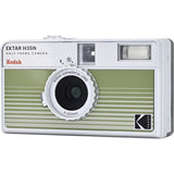 Light gray half-frame film camera angled front view with lens and flash window