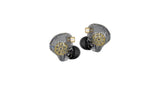 Two clear in-ear earbuds with black nozzle tips and gold EDX logo detailing