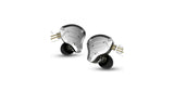 Silver-and-black in-ear headphones, angled view of earbuds and gold connector pins