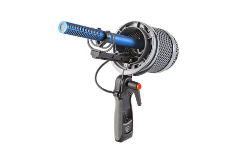 Microphone kit with blue barrel, mesh grille, circular mount, and handheld grip