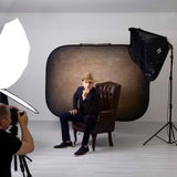 Walnut-toned portable backdrop panel used in a studio setup