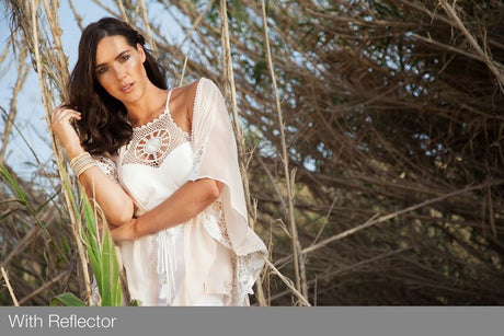 Model portrait outdoors; reflector not visible in frame
