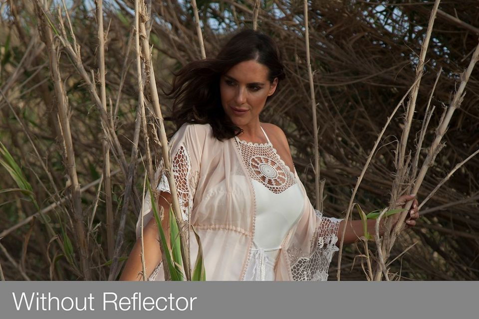 Model portrait outdoors; reflector not visible in frame