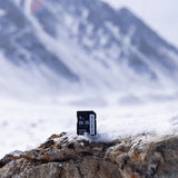 256GB SDXC UHS-I V30 SD card on snowy rocks