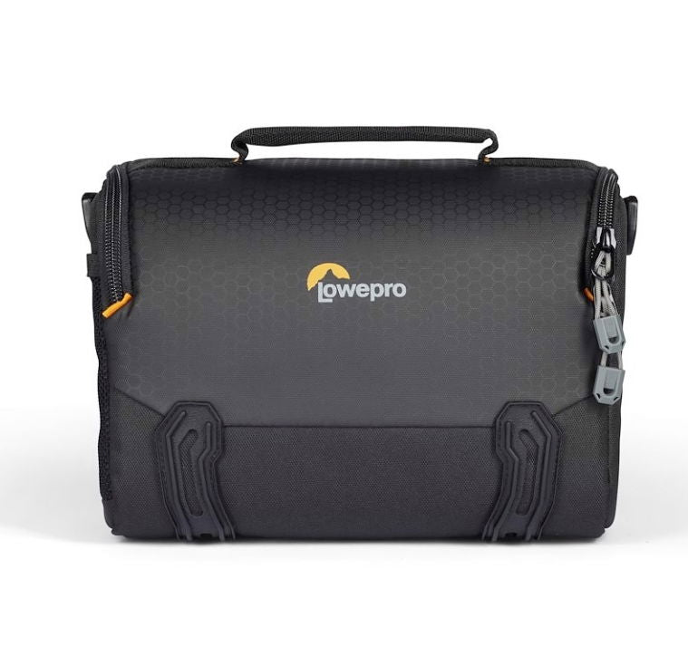 Black padded camera shoulder bag with logo, top handle, and side zipper pocket
