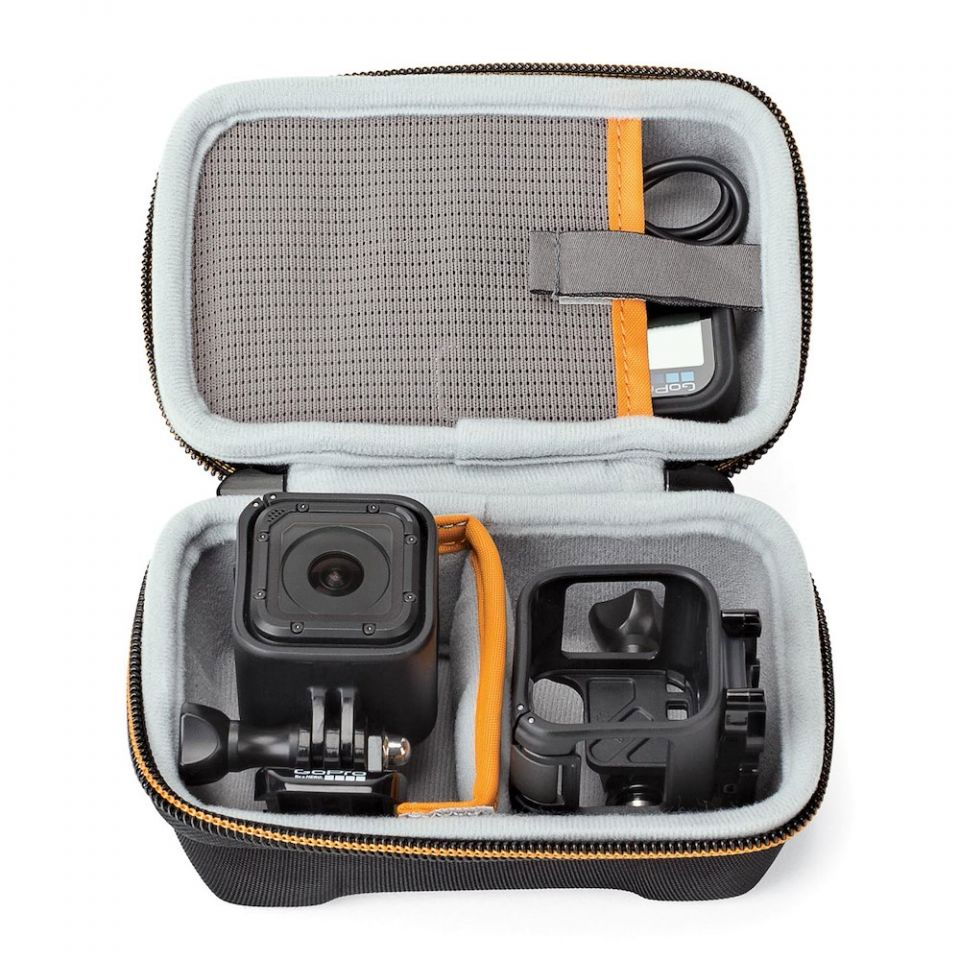 Open case interior with molded slots for action camera and mounts, gray lining