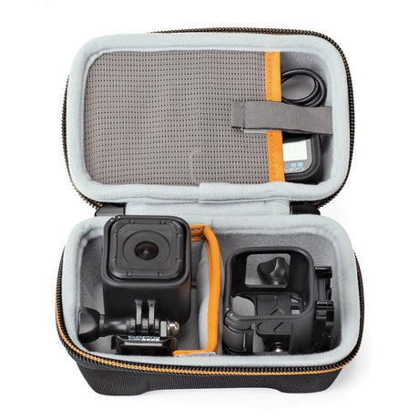 Open case interior with molded slots for action camera and mounts, gray lining