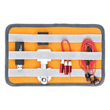 GearUp L cable organizer opened interior with orange lining, cable holders and ports