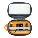 GearUp S pouch interior: orange lining with cables, power bank, and USB adapters