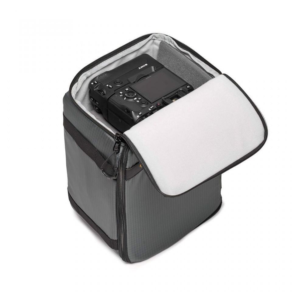 Open dark gray case with white inner panel, holding a camera and accessories