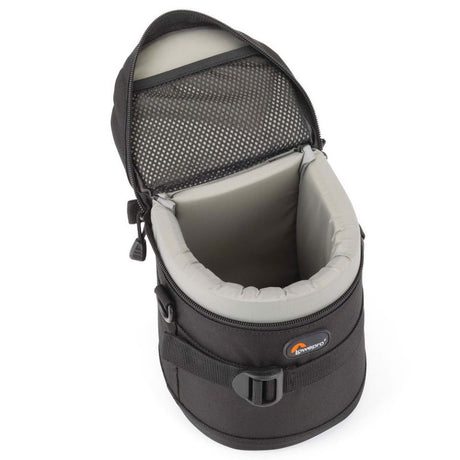 Open black lens pouch showing beige padded insert and internal storage walls