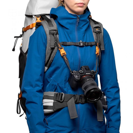 Accessory belt with zip pouch worn with adjustable shoulder straps for camera carry