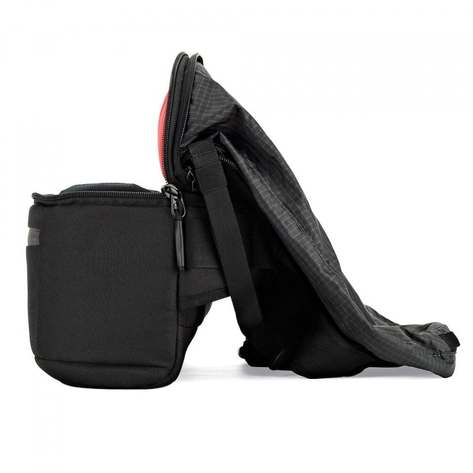 Side view of convertible backpack with front zip pocket and adjustable shoulder strap