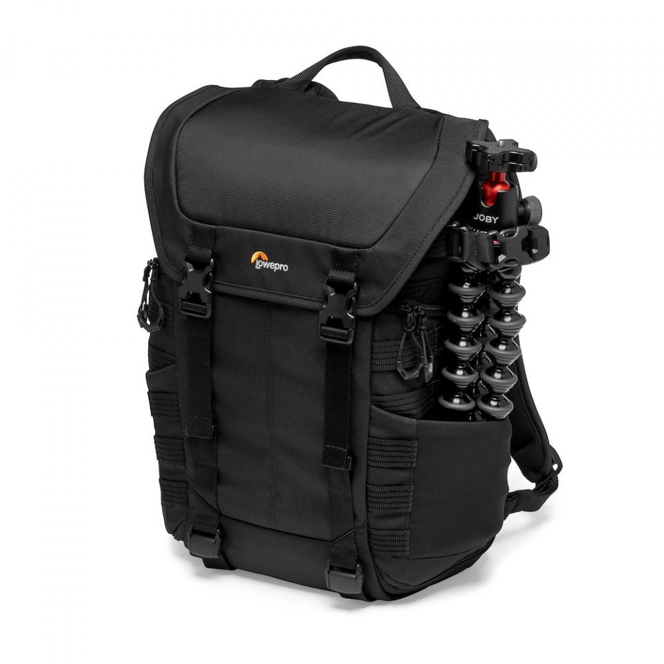 Black camera backpack with side panel storage and tripod legs secured on outer straps