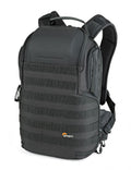 Black photo backpack with top handle, front zip pocket, and padded front panels