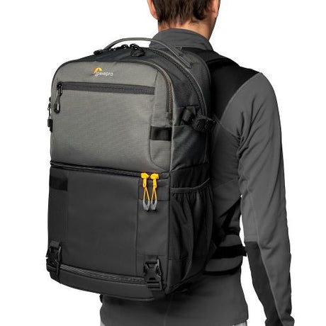 Fastpack Pro BP 250 AW III camera backpack worn on back, dark gray/black front panel