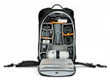 Open photo backpack showing padded camera compartments and elastic gear straps