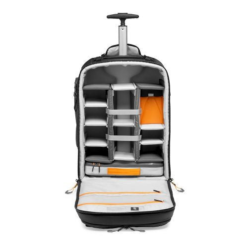 Open interior of rolling camera backpack with padded dividers and orange accents