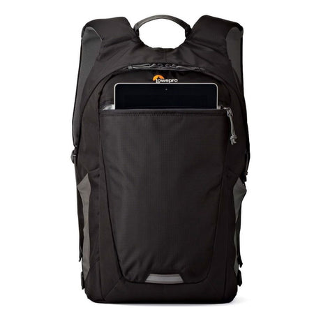 Black photo backpack rear view with top handle and central padded panel pocket