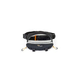 Open camera sling bag showing padded interior and gear compartment, dark gray/black