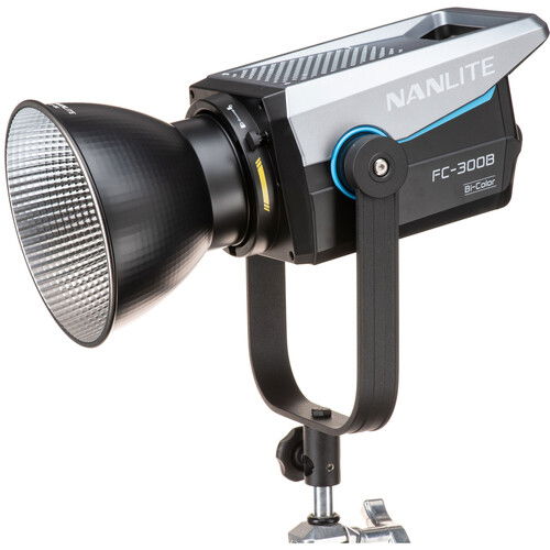 Bi-color LED studio light with front reflector and yoke mount, black/silver