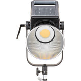 FC500B bi-color LED spotlight head front view with fan grille and round reflector lens