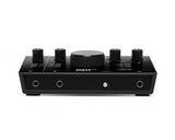 Audio interface top/front edge view with gain knobs and LED level indicators
