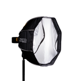 Octa softbox light modifier with black fabric and white interior, segmented front
