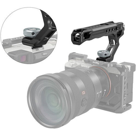 Cold shoe adapter mounted on a camera, close-up of textured top adjustment knob