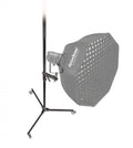 Black studio tripod with sliding arm and mounted softbox reflector